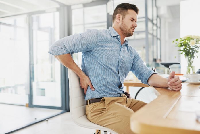 Should you 'fix' your posture? Why experts say always sitting up straight won't help your back pain.