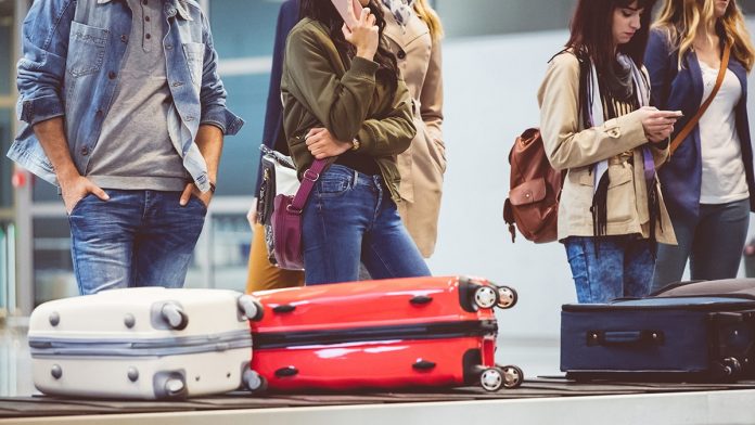 Flight passenger on Reddit accused of being 'rude' at luggage carousel as etiquette expert weighs in