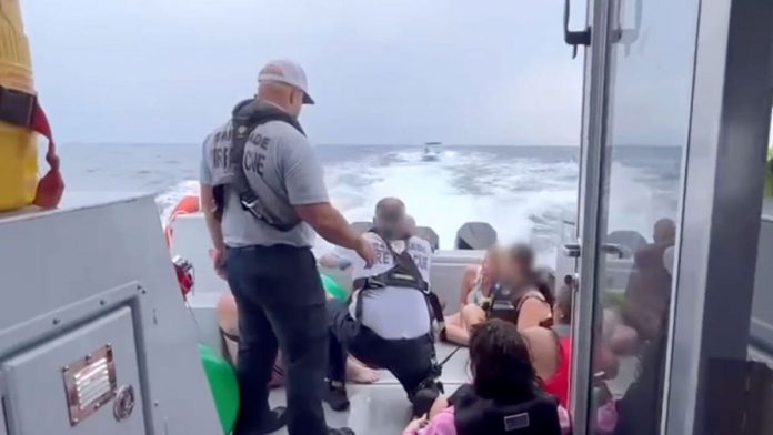 Eight people rescued from sinking boat after running low on fuel in rough Miami waters