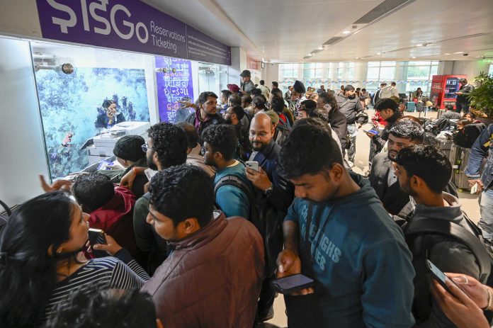 The operator of India's largest airline sees shares tumble after thousands of cancelations