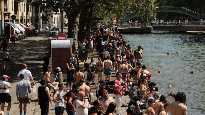 Popular city bans public alcohol amid heat wave as people take risks to cool down