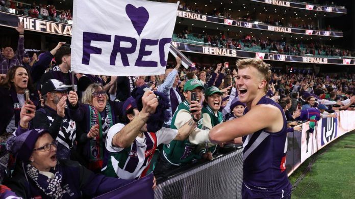 Airlines accused of gouging as Fremantle fans make way to the MCG for AFL grand final